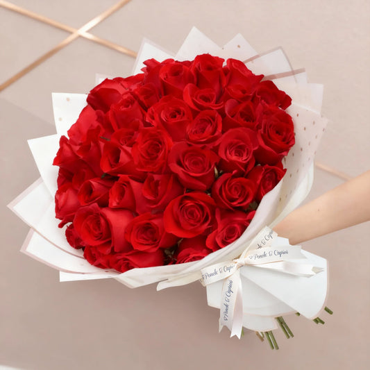 50 rosas, 100 rosas o 150 Rosas Rojas en ramillete con papel blanco. Floreria CDMX