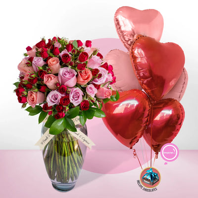 Arreglo Floral de Rosas Rosadas, Náutica y Mini Rosas Rojas