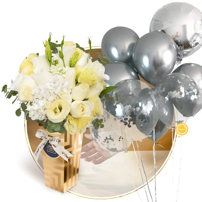 Floral arrangement of white roses Hortensias and Lisianthus with a 9 -silver balloon bouquet