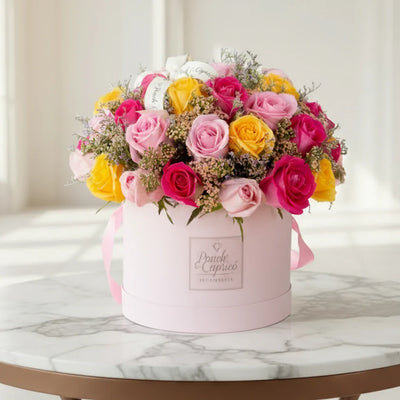 Domo de 40/45 Rosas Amarilla, Rosadas y Fuchsia con aquilea y limonio. Flores a domicilio Ponch y Caprico