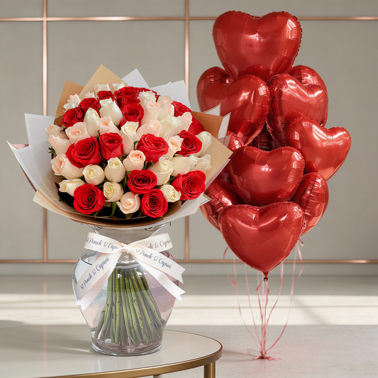Ramo de rosas rojas y globos de corazón rojo inflados con helio - Ramo Buchon en CDMX