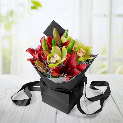 Orquídeas, Lillies Vino, Rosas, Minfer y Limonio. Floreria Ponch y Caprico.